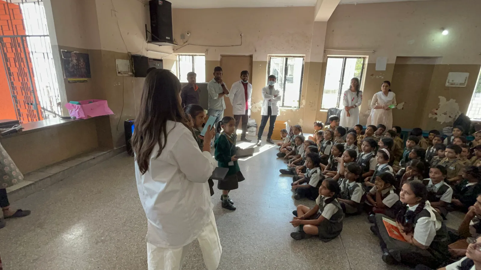 Prudentoe dentist conducting a dental awareness session for school children in Hyderabad